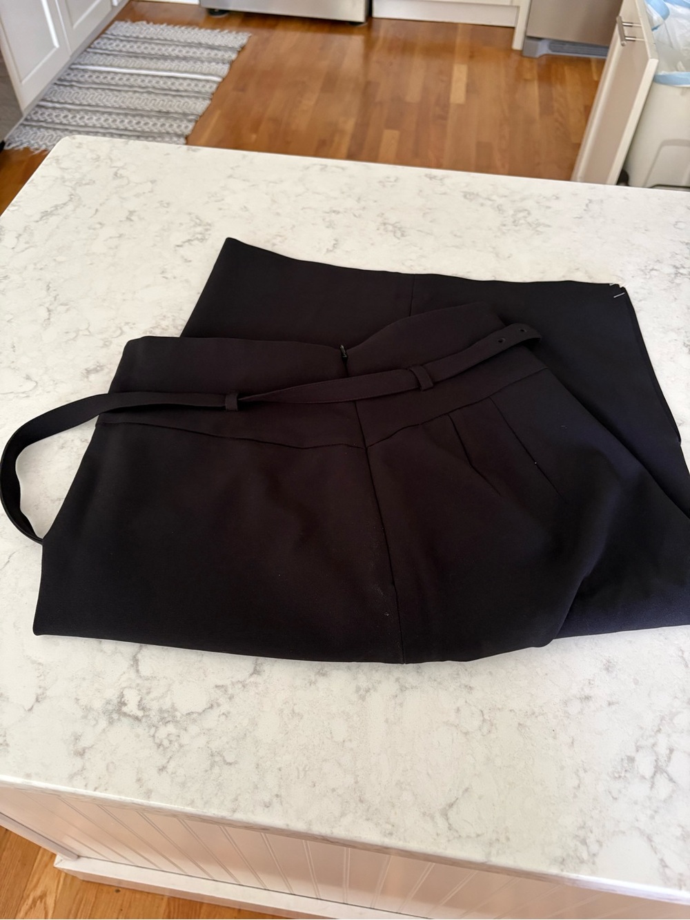 Woman’s skirt express black pencil with thin belt